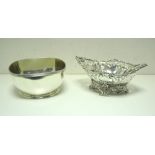 An American metalwares bon bon dish, by Gorham & Co, of pierced navette form within a scrolled edge,