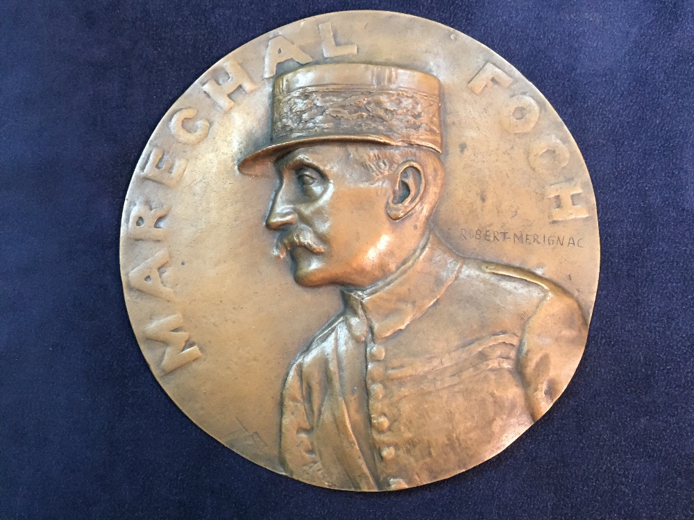 Three French bronze relief plaques, the first depicting Georges Clemenceau, another of Marechal Foch