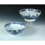 A Lowestoft blue and white bowl, the exterior painted with stylised peony flowers growing on long