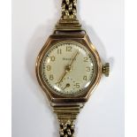 Retailed by Mappin - a lady's 9ct gold cased wristwatch, with white dial with gold coloured hands