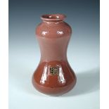 Poh Chap Yeap, a double gourd vase, with sang de boeuf glaze, incised signature 17½cm (7in)