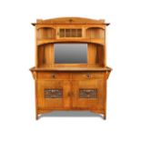 Robson & Sons, Newcastle-on-Tyne, an Arts & Crafts oak dresser, the top with central leaded glass