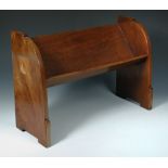 A Glasgow School mahogany book trough, the shaped end panels each with stylised foliate inlays 37