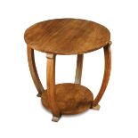An Art Deco walnut occasional or lamp table, the circular veneered top raised on four bowed supports