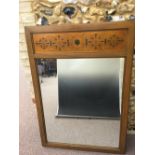The Union Mirror Co., Lenoir, NC, an Arts & Crafts style wall mirror, the top with painted frieze