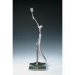 A Hagenauer style model of a silvered metal tennis player, mounted as a trophy from 1934, the