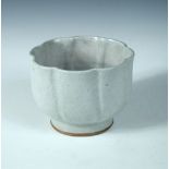 Charles Vyse, a stoneware bowl, the lobed form with pale grey glaze, incised marks 8½cm (3in)