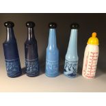 Salvador Dali for Rosso Antica, a collection of four glass bottles, circa 1970, each of slender