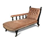 An Aesthetic period ebonised chaise longue, possibly by Lamb of Manchester, the swept back support