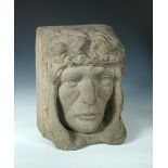 An Art Nouveau style carved sandstone figurehead, the face with long flowing hair, the back in the