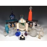 A collection of glass scent bottles, to include L'air De Temps by Nina Ricci in original box, Les