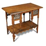 Liberty & Co., a Moorish style walnut two tier occasional table, the rectangular top above mosharabi