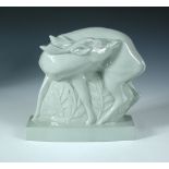 John Skeaping for Wedgwood, a celadon glaze model of a deer, modelled standing preening its