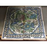 A set of four Middle Eastern floral tiles (4)