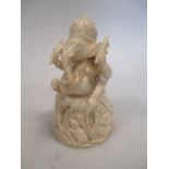 An Indian ivory figure of Ganesh