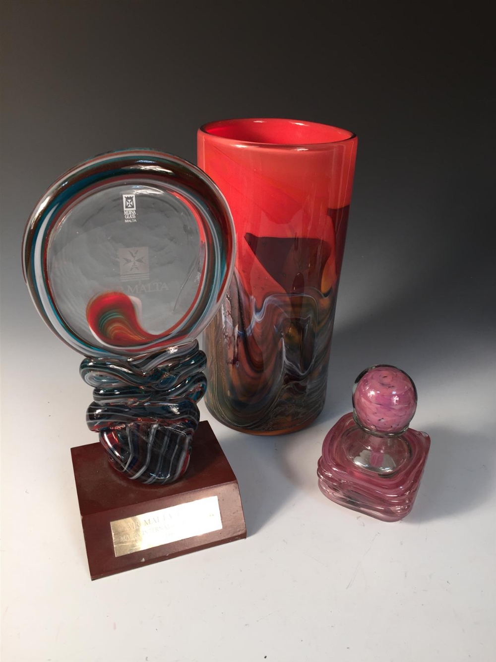 A large Mdina glass vase, of cylindrical form, together with a Mdina glass 'Air Malta Trophy' and