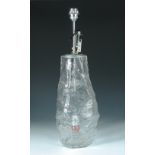 Attributed to Timo Sarpaneva, a large glass lamp base, the iceberg form with central chromed rod and