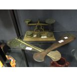 A set of brass letter scales and travelling set of far eastern opium scales (2)