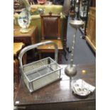 An Art Deco style Adnet bottle holder, together with an Adnet silvered bronze candlestick in the