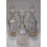 A pair of decanters together with another Victorian decanter (3)