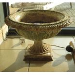 A pair of late Victorian cast iron garden urns, 55cm diameter