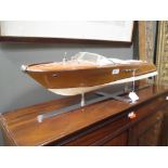 A Riva style model boat, on stand, 66cm long