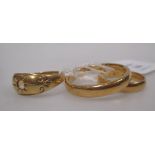 A 22ct wedding band (4.1g), an 18ct ring (2.2g) and a yellow precious metal ring (marks worn,