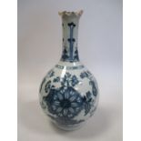 An 18th century English Delft blue and white bottle
