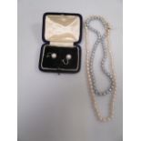 A pearl necklace with a 9ct pearl cluster clasp, 49cm long, a pale grey pearl necklace, 39cm long