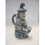 A faience character jug depicting Mr. Punch