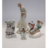 A Goebel figure group of two children, a Pirken Hammer figure of a lady, a Vienna porcelain figure