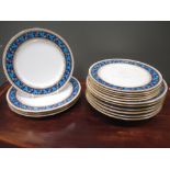 A Minton part dinner service Usual minor chips to rim, rubbing to gilding. One large plate is