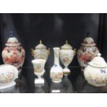 A pair of Coalport porcelain urns, an Aynsley pot and cover and three vases and a pair of Imari urns