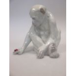 A Heubach Gebruder porcelain model of a monkey with a ladybird (R)
