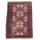 A Shirvan blue and ivory ground rug, 218 x 136cm (85 x 53in)