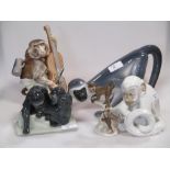 A Vienna porcelain model of a monkey, a Keramis monkey and two others (4)