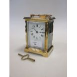 A Mappin & Webb brass carriage clock