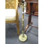 A 19th brass door stop 66cm tall