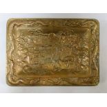 An early 20th century bronze rectangular dish cast with the scene of two cranes standing before a