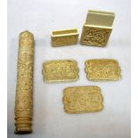 A late 19th century ivory visiting card case, three relief carved pin cushion covers, bone cased