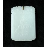 A 19th century pale green jade pendant, of rectangular tablet form carved in relief with a figure on