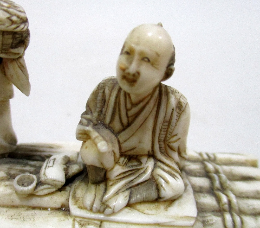 Toshikazu', an early 20th century ivory raft group, the sectional figures of the father seated - Image 3 of 7