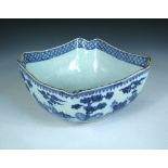 A late 18th/early 19th century blue & white bowl, the rounded square shape with indented corners,