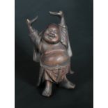 A 19th century ivory card case, enamel matchbox sleeve, chopsticks and wooden Budai figure, the