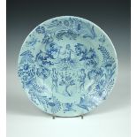 An early 18th century Delft blue and white armorial plate painted with the arms of the Pipemaker's