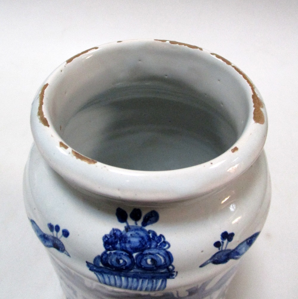 A pair and another mid 18th century Delft blue and white drug jar, the pair raised on flared - Image 6 of 10