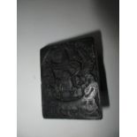 A 17th century carved wood printing block for a 'Derby' trade card, the banner above the central