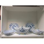 A Meissen blue and white lattice matched dessert service decorated with the flowering onion pattern,