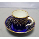 A Sevres jewelled blue ground coffee can and saucer, date letter A for 1753 and painter's mark of