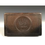 An early 19th century horn cased Swiss key wound musical box, the rectangular lid moulded with